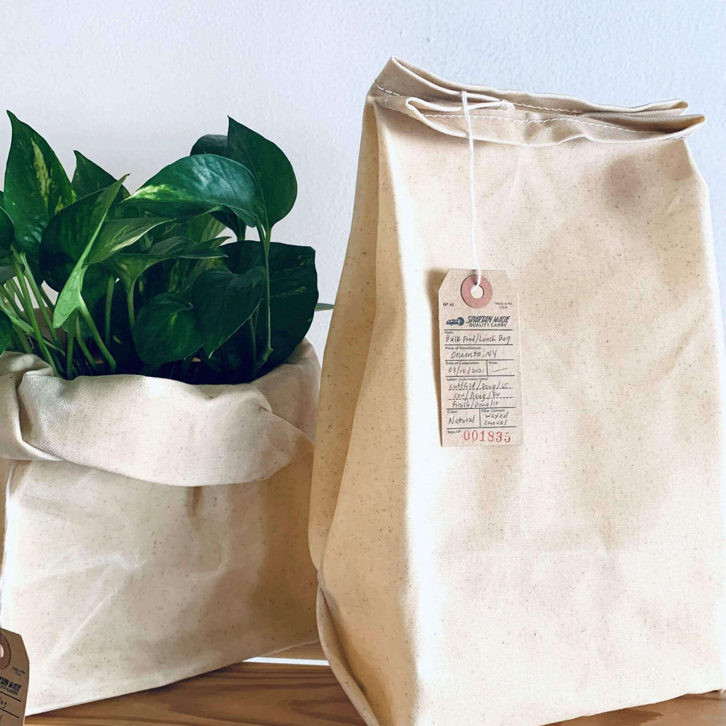 reusable-waxed-canvas-bag-with-plant